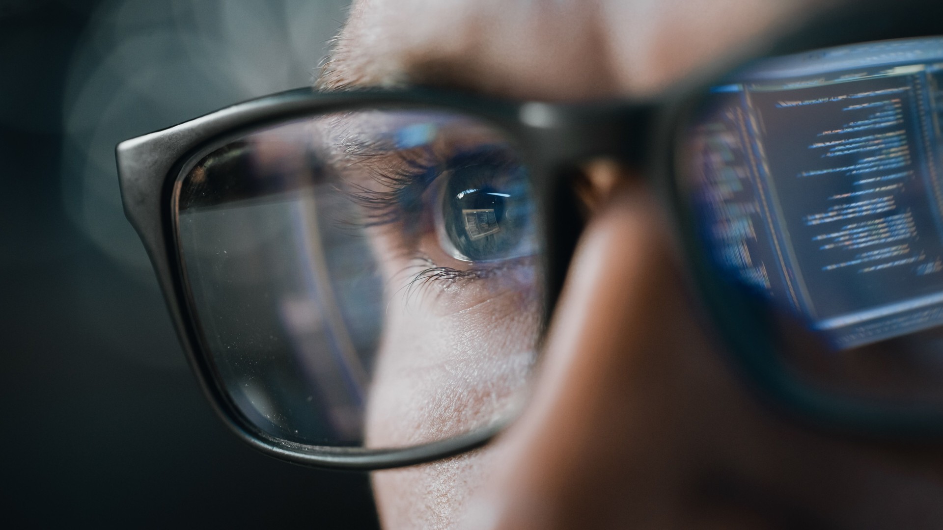 Close-up Portrait of Software Engineer Working on Computer, Line of Code Reflecting in Glasses. Developer Working on Innovative e-Commerce Application using Machine Learning, AI Algorithm, Big Data Close-up Portrait of Software Engineer Working on Computer, Line of Code Reflecting in Glasses. Developer Working on Innovative e-Commerce Application using Machine Learning, AI Algorithm, Big Data